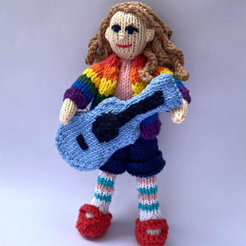 Senna doll with guitar