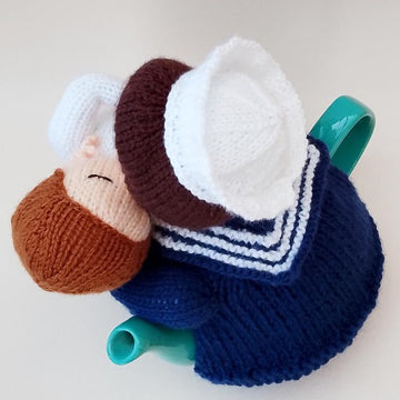 End of the War Kiss Tea Cosy