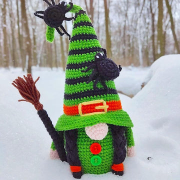 Halloween witch with a broom