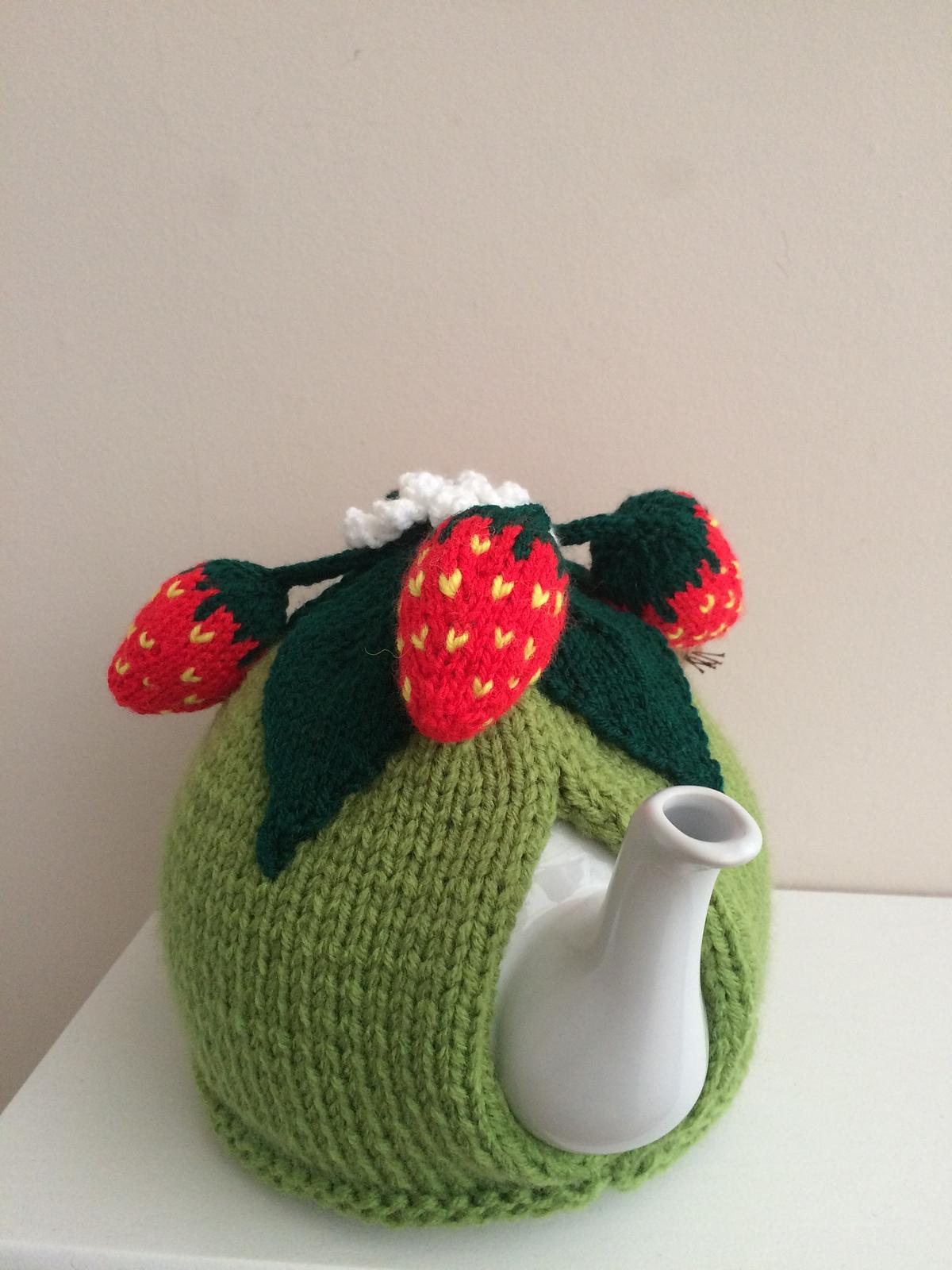 Nature tea cosy. Animal tea cosy .Pesky mouse in the strawberry patch