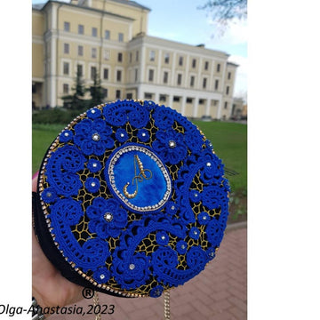 Evening bag round with Irish crochet lace