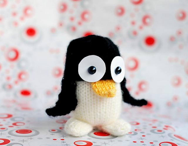 New Year Penguin in hat with Christmas tree