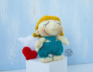 Small Cupid doll knitting flat