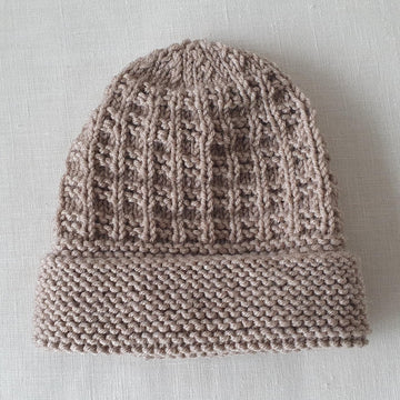 Olly - Baby’s 8ply texture stitch beanie with garter brim