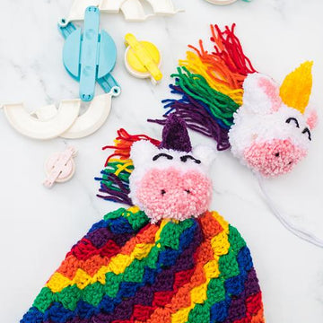 C2C Rainbow Hat with Unicorn Pom Pom