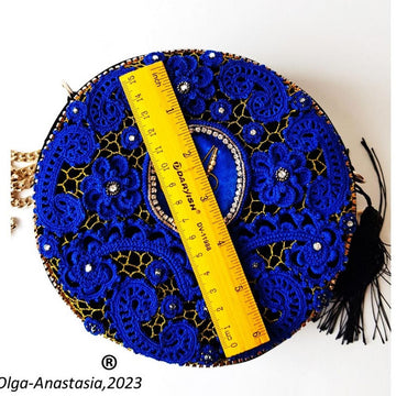 Evening bag round with Irish crochet lace
