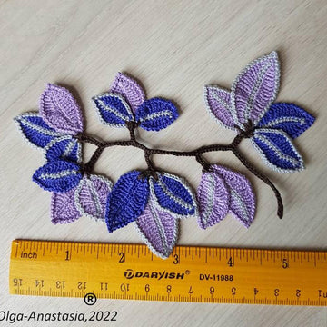 Branch with blue leaves