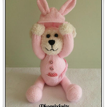 Teddy in a bunny onesie