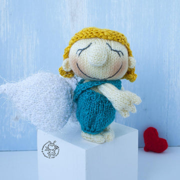 Small Cupid doll knitting flat