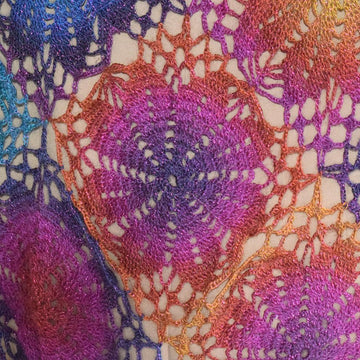 Flower scarf and shawl in one.