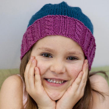 Naughty or Nice Pompom Hat