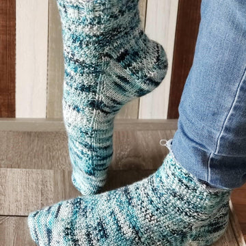 Pebbles on the beach socks