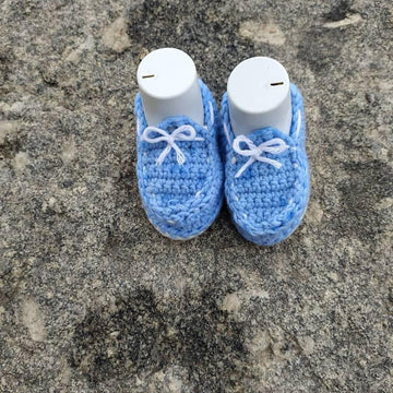 Baby moccasins worked flat