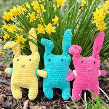 Bunnies with backpack and easter eggs