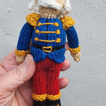 Knitted nutcracker doll