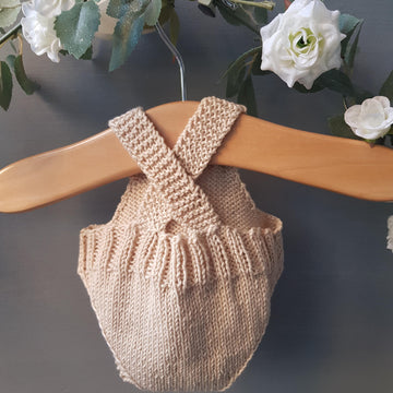 Knitted dolls romper