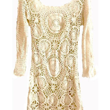 Crochet mini open back dress.