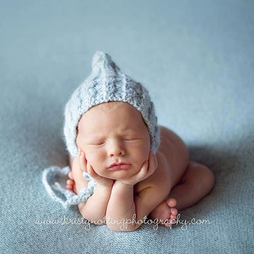 #56 Newborn cable pixie hat