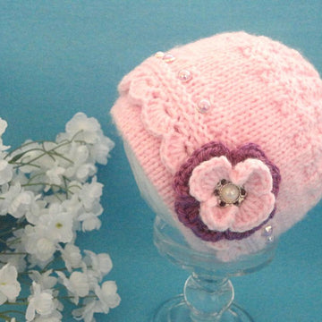 Knitted Baby Girl Hat with Crochet edging and Flower