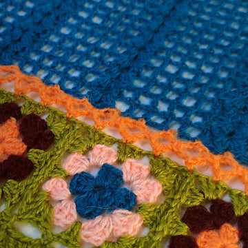 Farfallina patchwork crochet scarf with fringe
