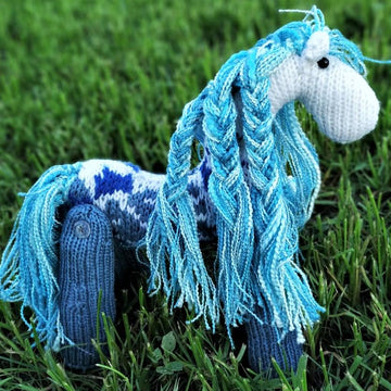 Horse with blue rose