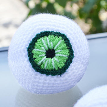 Crochet eyeballs. Creepy eyes. Halloween spooky eyes. Eyeball with blood vessels