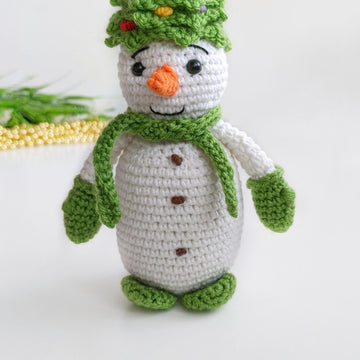 Crochet snowman in a Christmas tree hat amigurumi pattern