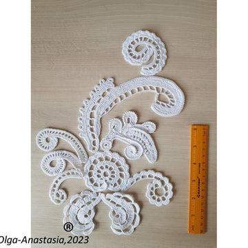 White composition of antique crochet motifs