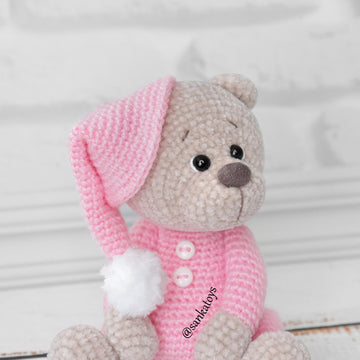Plush bear in sleepwear