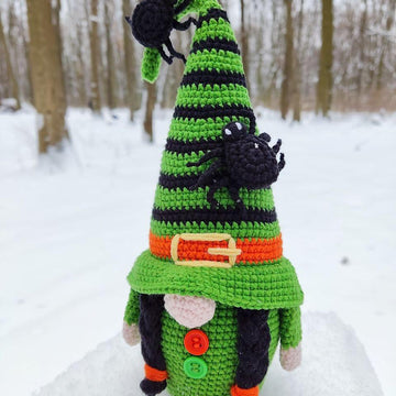 Halloween witch with a broom