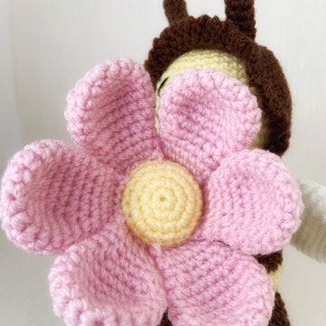 Bee amigurumi with flower