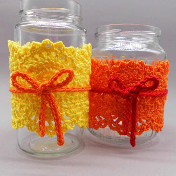 Crochet shabby style decoration from scraps of yarn for used glasses