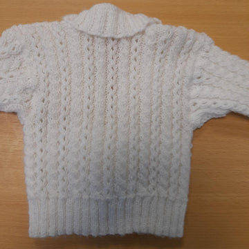 Cross-over baby cardigan