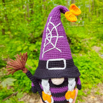 Halloween gnome (girl) with a broom