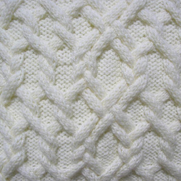 Cabled knitted cushions