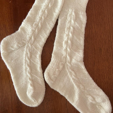White socks with cables