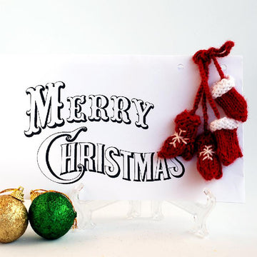 Small mittens for christmas or new year greeting card.