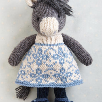 Horse/donkey/unicorn in a dress