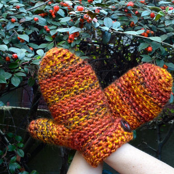 Mittens with a button