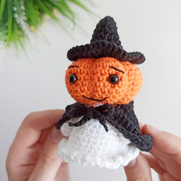Halloween ghost with a pumpkin head