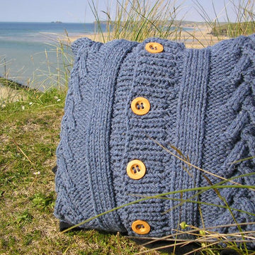 Cabled knitted cushions