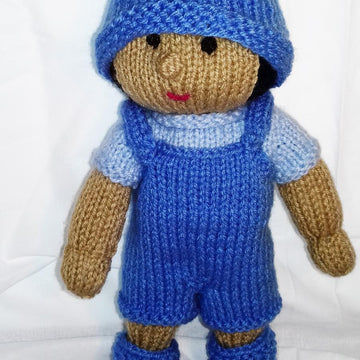 Dressing up baby doll with clothes