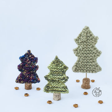 Many Christmas trees knitted flat