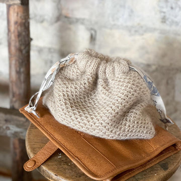 Ruke clutch bag