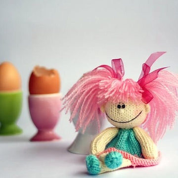 Funny small doll with pink hair for keeping warm breakfast egg
