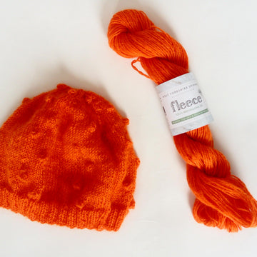 Pure wool orange hat with bobbles