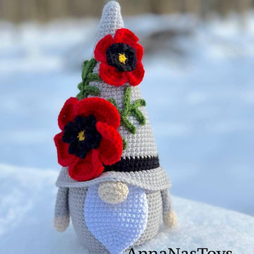 Gnome with poppy flower