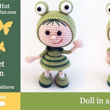 118 Girl Doll in a frog outfit