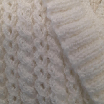 Cross-over baby cardigan