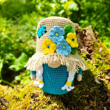 Gnome (girl) in a straw hat